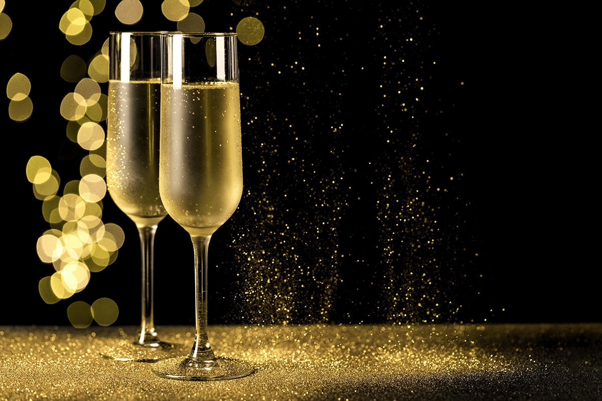 Champagne Glasses With Bokeh Lights