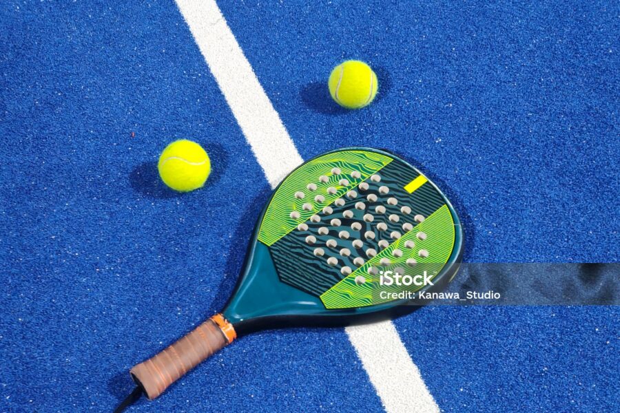 Close Up Shot Of Padel Tennis Racket And Balls