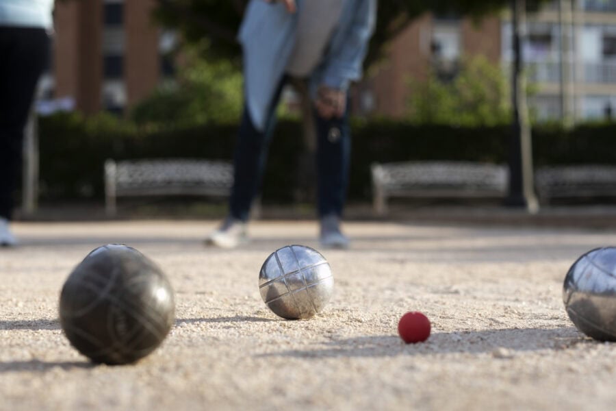 Elderly Friends Playing Petanque